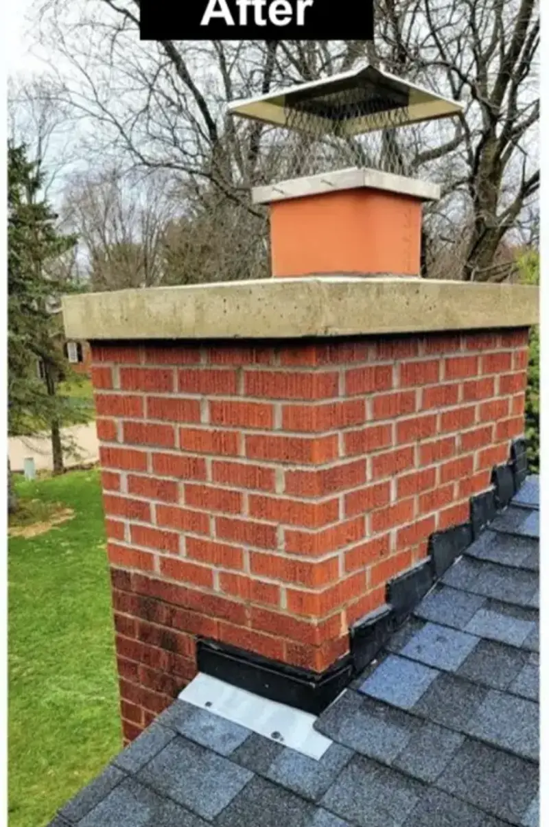 Chimney after repair: new brick, chimney cap and flashing